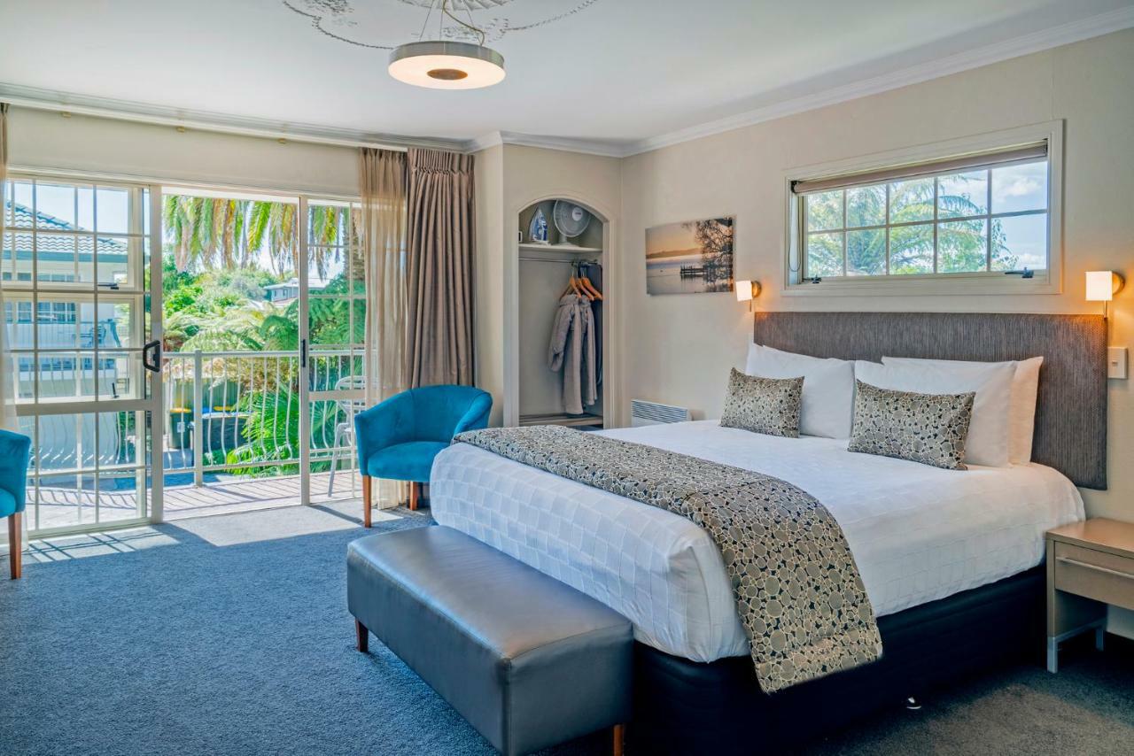 Silver Fern Rotorua Suites & Spa Luaran gambar A bedroom at the hotel